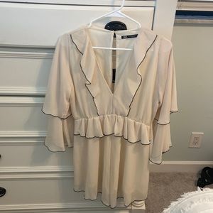 Zara Creme shorts jumpsuit with black ruffled trim